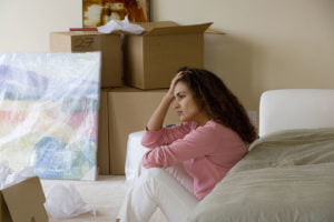 Image of a woman stressing on moving day