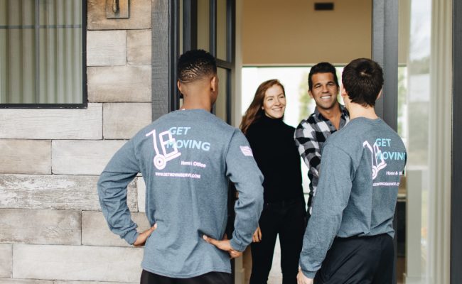 This image shows the Get Moving crew greeting customers.