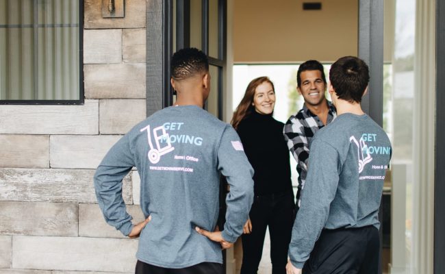 This image shows the Get Moving crew greeting customers.