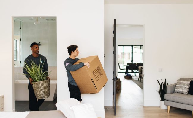 Get Moving crew members doing an apartment move.